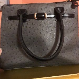 Hynes Eagle grey purse with black handles